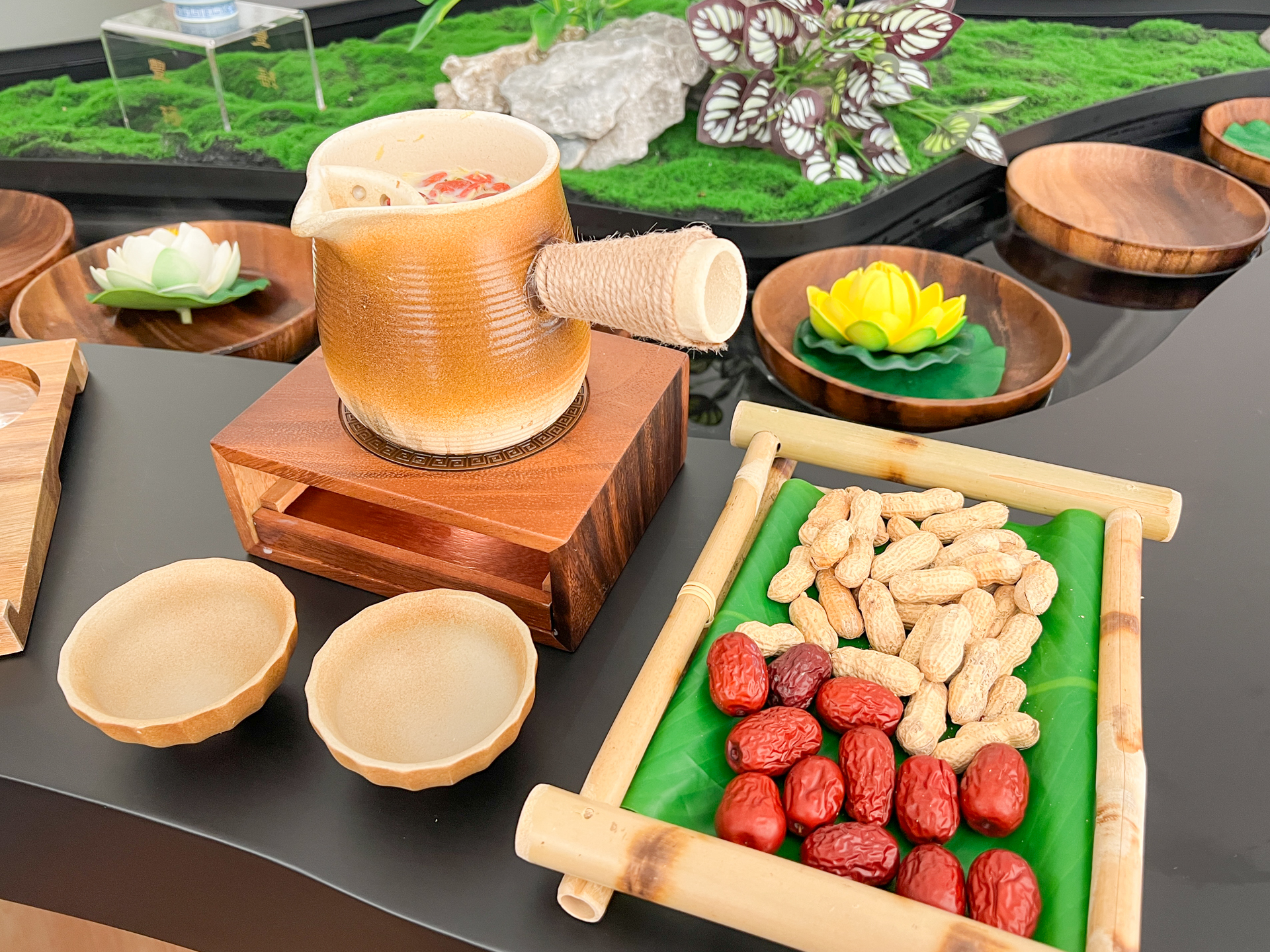 Incloud Singapore review - floating river teahouse with water table