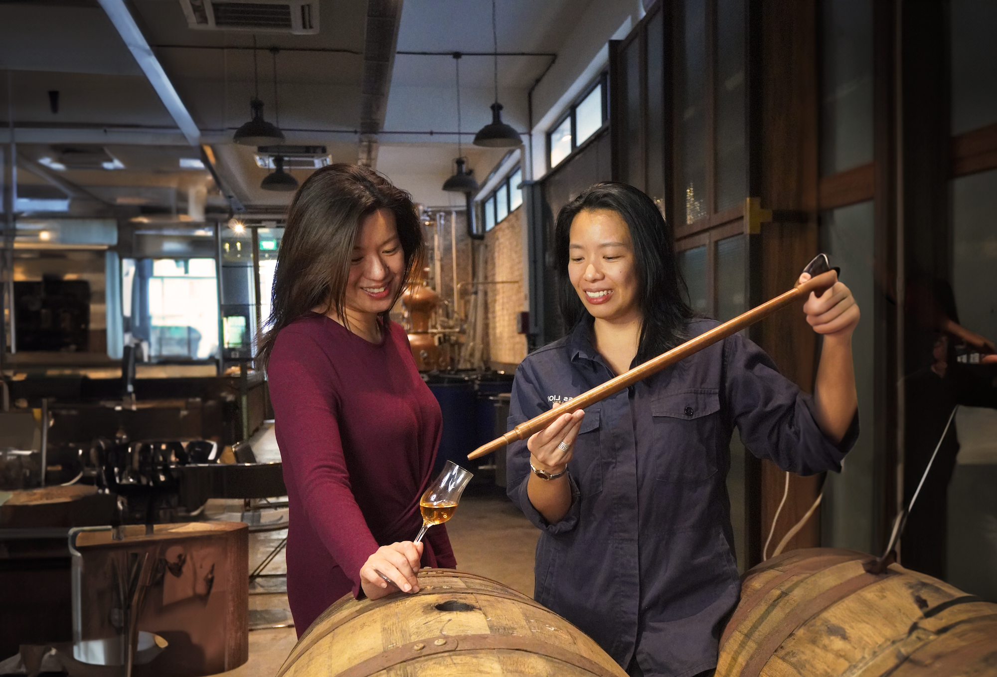 Brass Lion Distillery Founder Jamie Koh draws from the barrel