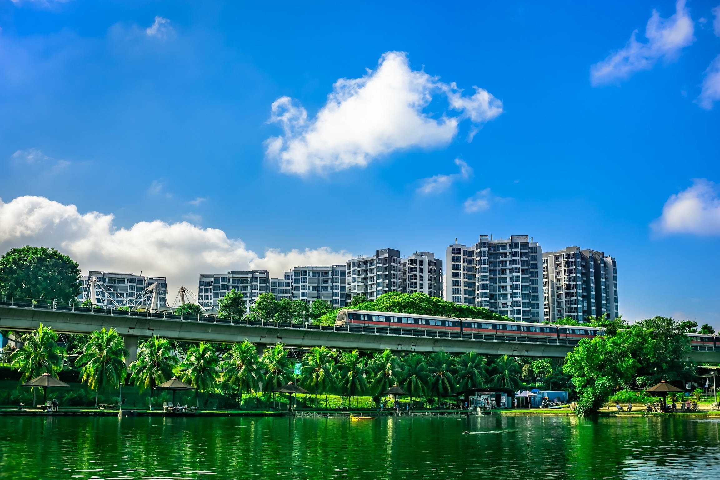 MRT Train passing with The Estuary codo in the background, Yishun Town, Singpore.