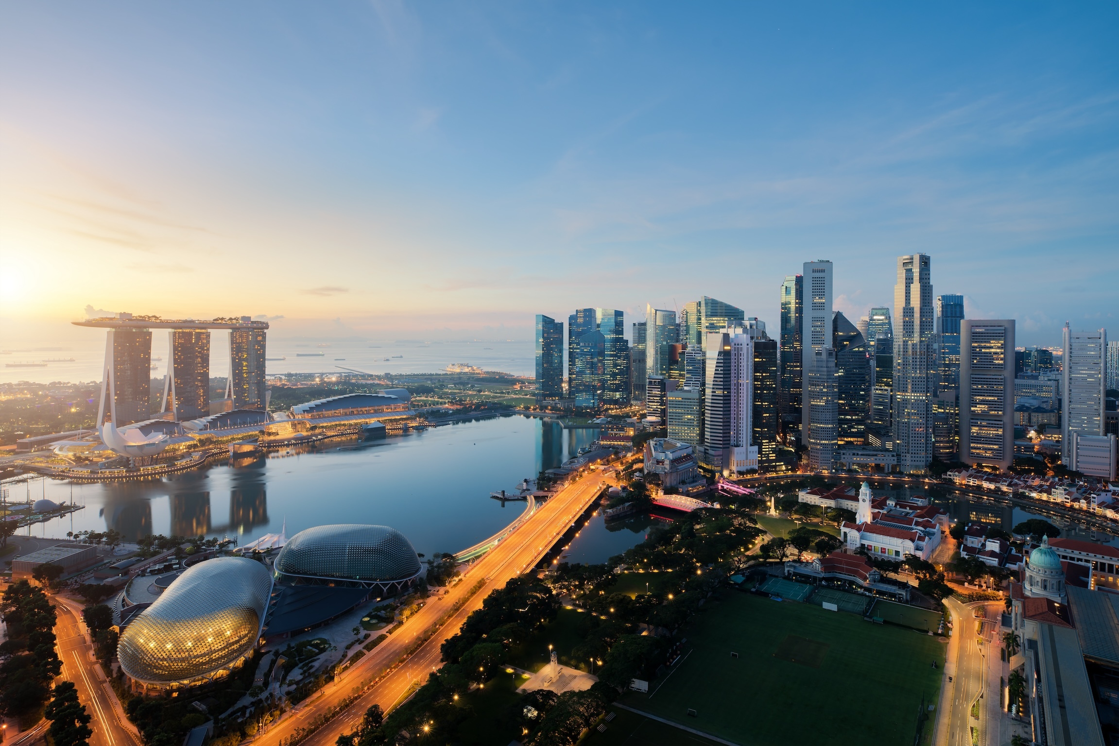 Aerial view of Singapore business district and city at twilight in Singapore, Asia