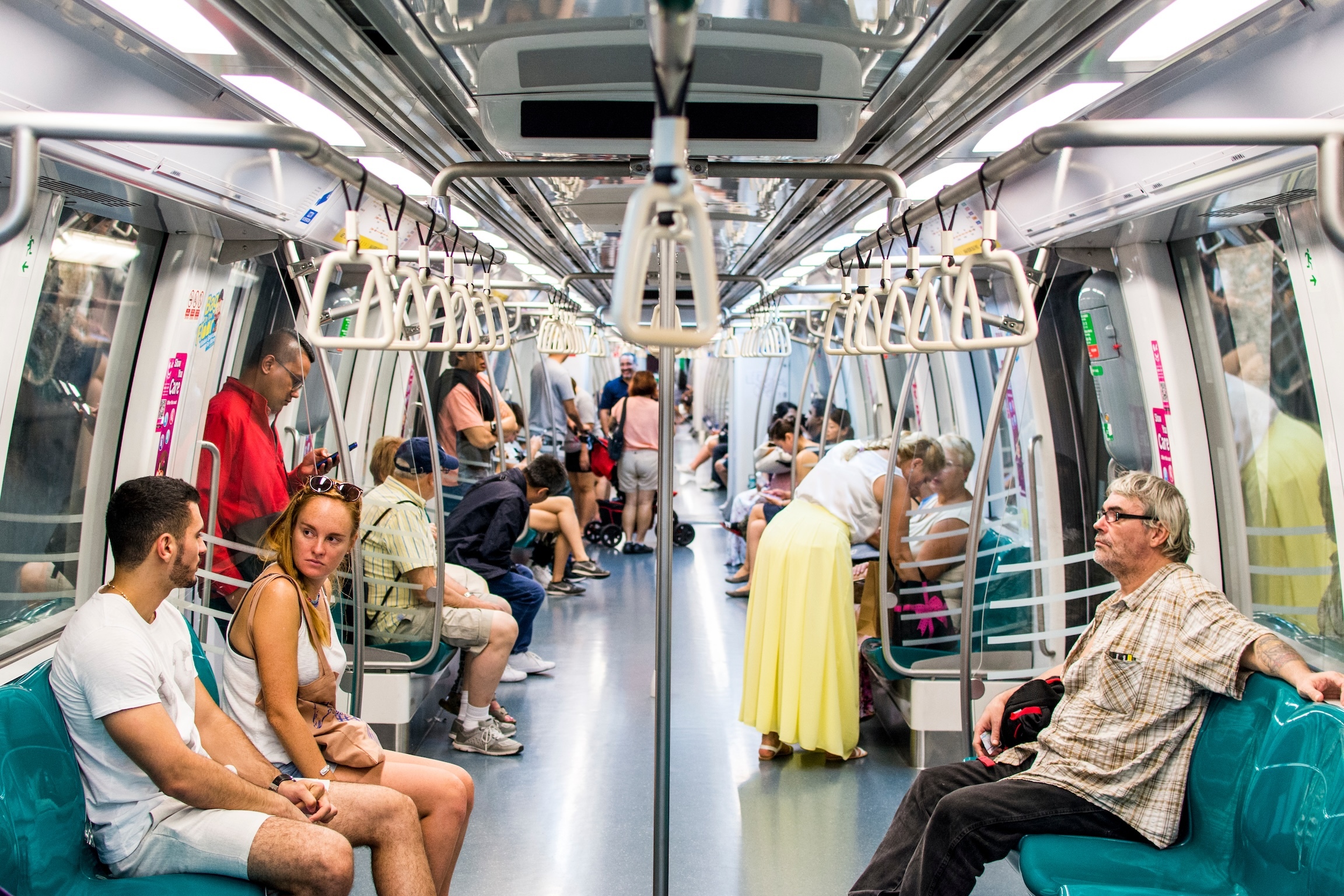 MARINA BAY, SINGAPORE - NOV 3, 2018: Interior of Singapore MRT Circle line C830 trains with moderate number of passengers