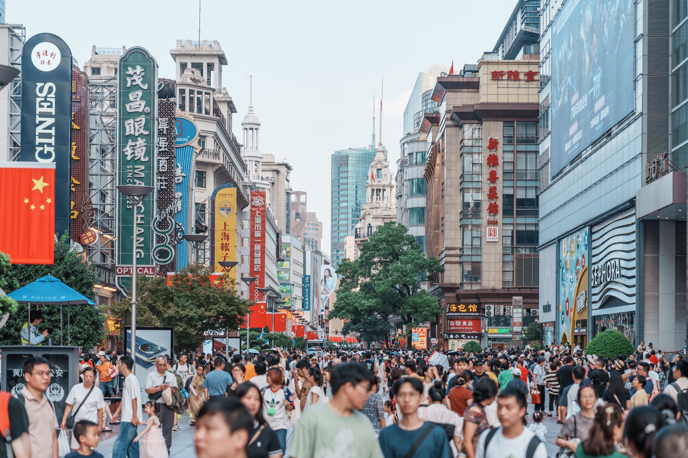 Shanghai, China - Oct 05 2025: During the 2025 National Day and Mid-Autumn Festival Golden Week holiday, there was a constant stream of Chinese and foreign tourists on Nanjing Road in Shanghai.