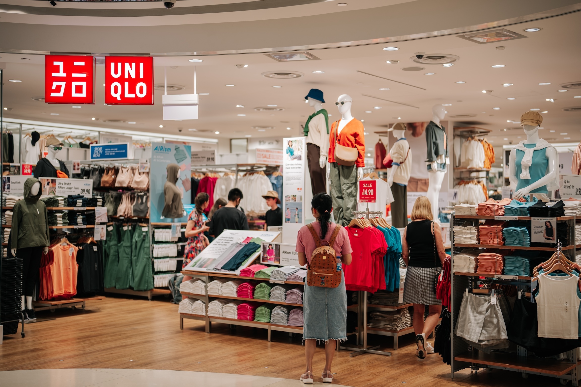 Singapore - July 31, 2023 : Entrance to Uniqlo store in Orchard rd, Singapore. Uniqlo Co., Ltd. is a Japanese casual wear designer, manufacturer and retailer.