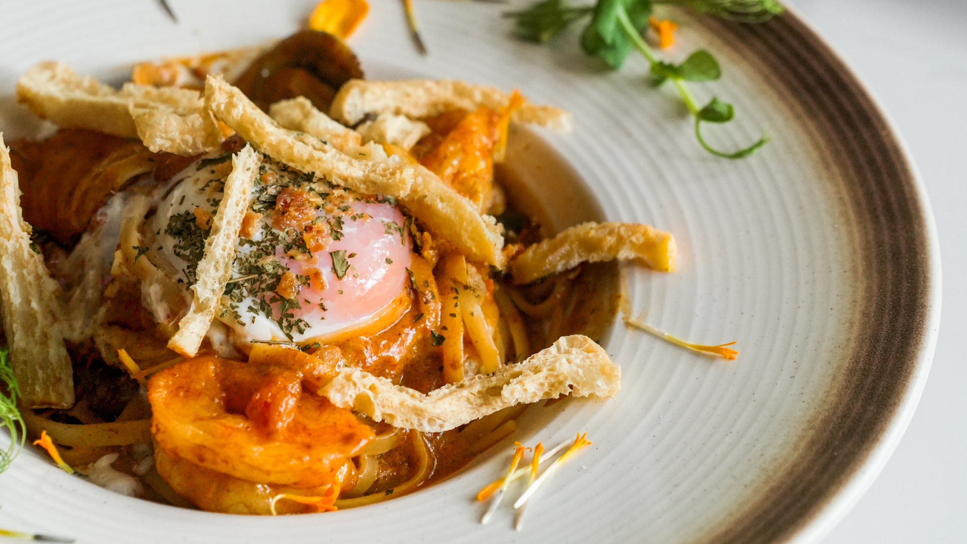 Must-try dishes to savour at Jiak by the Quay, from laksa linguine to Peking duck tacos